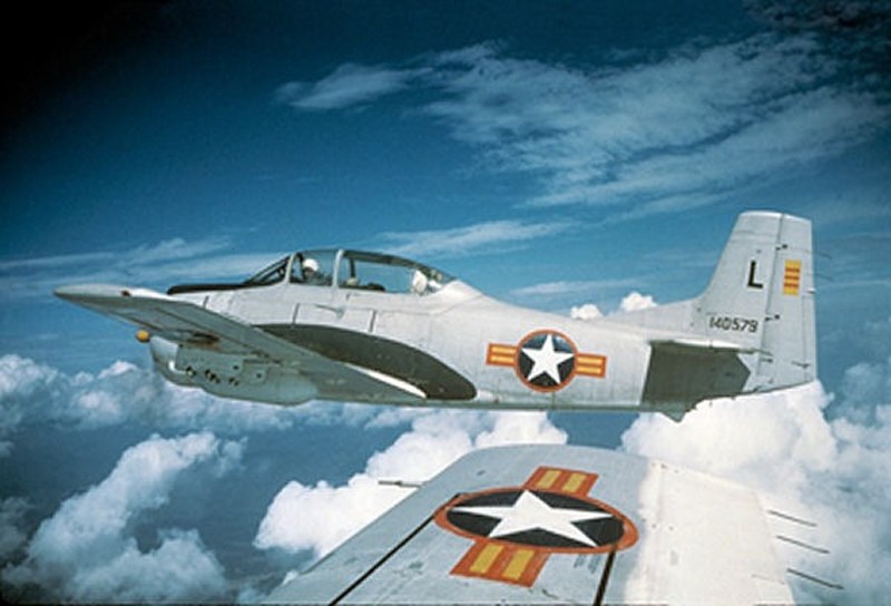 Photo of a U.S. North American T-28D Trojan with South Vietnamese markings, flying over Vietnam in the early 1960s. (U.S. Air Force)